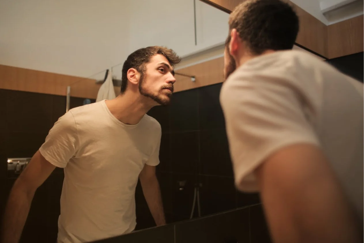 A young man in the mirror