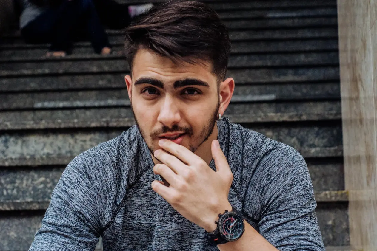 a young man with a short beard